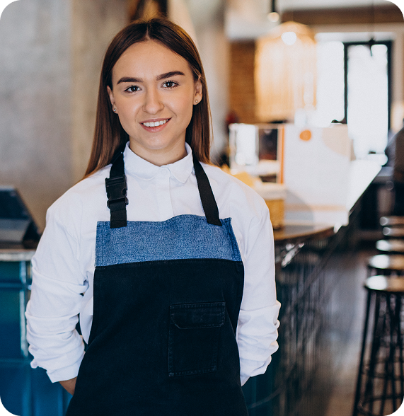 Young female restaurant worker smiling in a café – hourly customer service job through Ponte